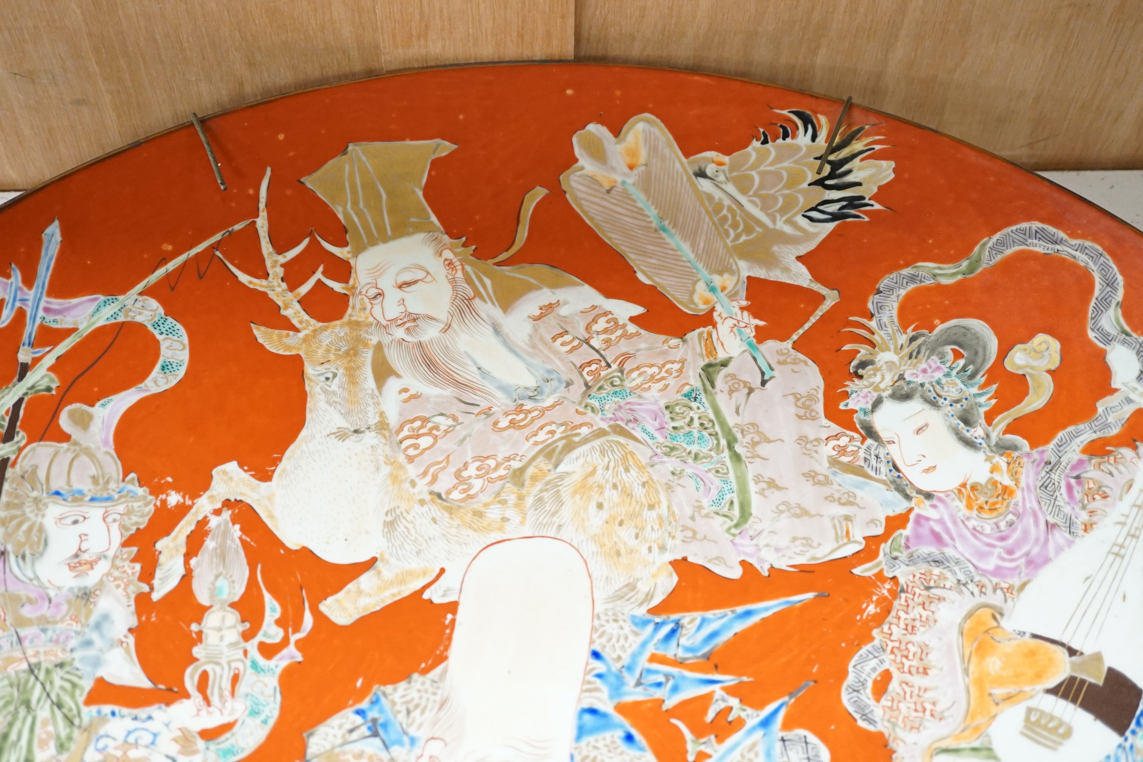 A massive Japanese Arita 'Seven Gods of Happiness' dish, Meiji period, 60.5cm.